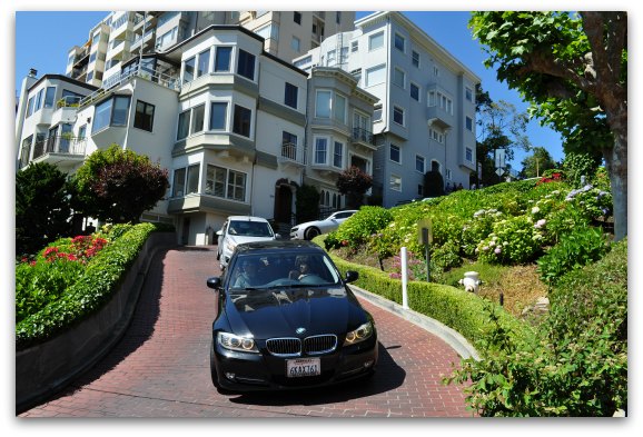 Cars coming down the steep Lombard Street hill